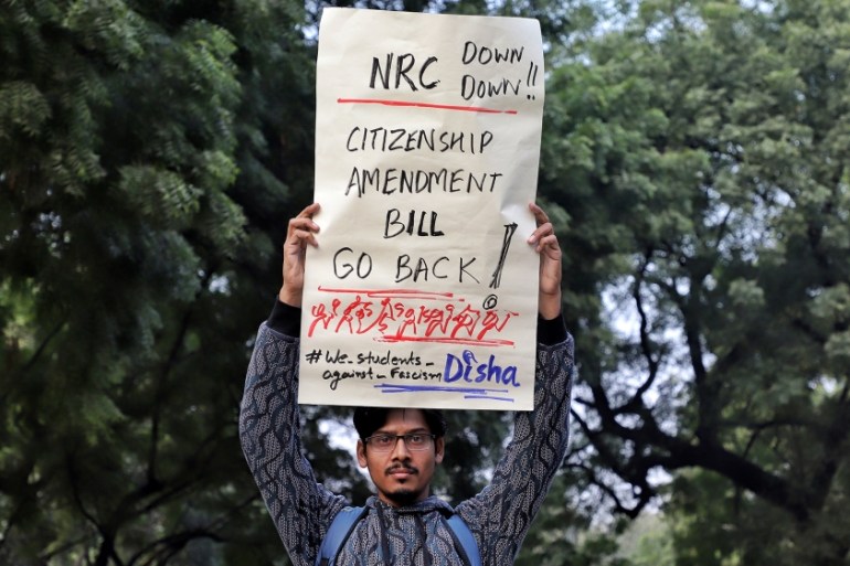 A boy holds a placard as they protest against the Citizenship amendment bill and National Register of Citizens (NRC) in New Delhi, India on 07 December 2019 (Photo by Nasir Kachroo/NurPhoto via Getty