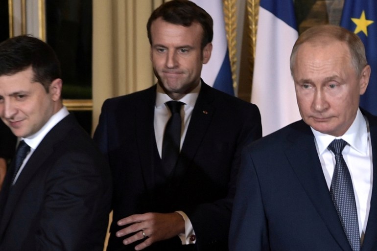 Russian President Putin, French President Macron and Ukrainian President Zelenskiy attend a summit in Paris