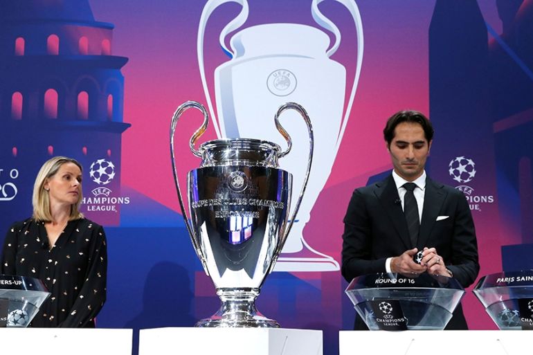 Soccer Football - Champions League - Round of 16 draw - Nyon, Switzerland - December 16, 2019 Hamit Altintop and Kelly Smith during the draw REUTERS/Denis Balibouse
