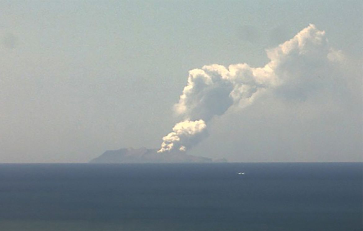 This handout image from a webcam belonging to the Institute of Geological and Nuclear Sciences shows the volcano on New Zealand''s White Island spewing steam and ash on December 9, 2019. - At least one