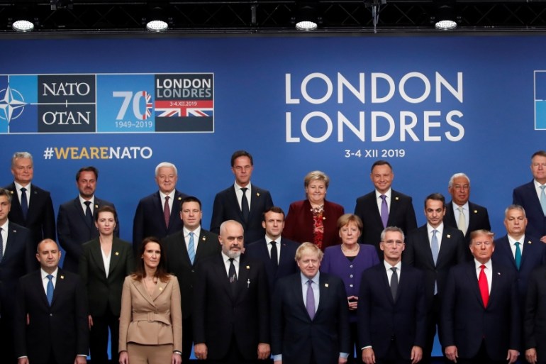 NATO leaders pose for a family photo during the NATO summit at the Grove hotel in Watford, northeast of London on December 4, 2019. CHRISTIAN HARTMANN / POOL / AFP