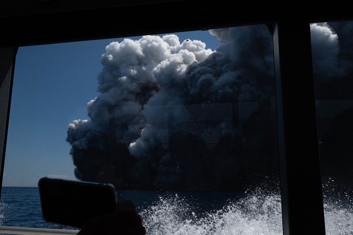 An image provided by visitor Michael Schade shows White Island (Whakaari) volcano, as it erupts, in the Bay of Plenty, New Zealand, 09 December 2019. According to police, at least five people have die