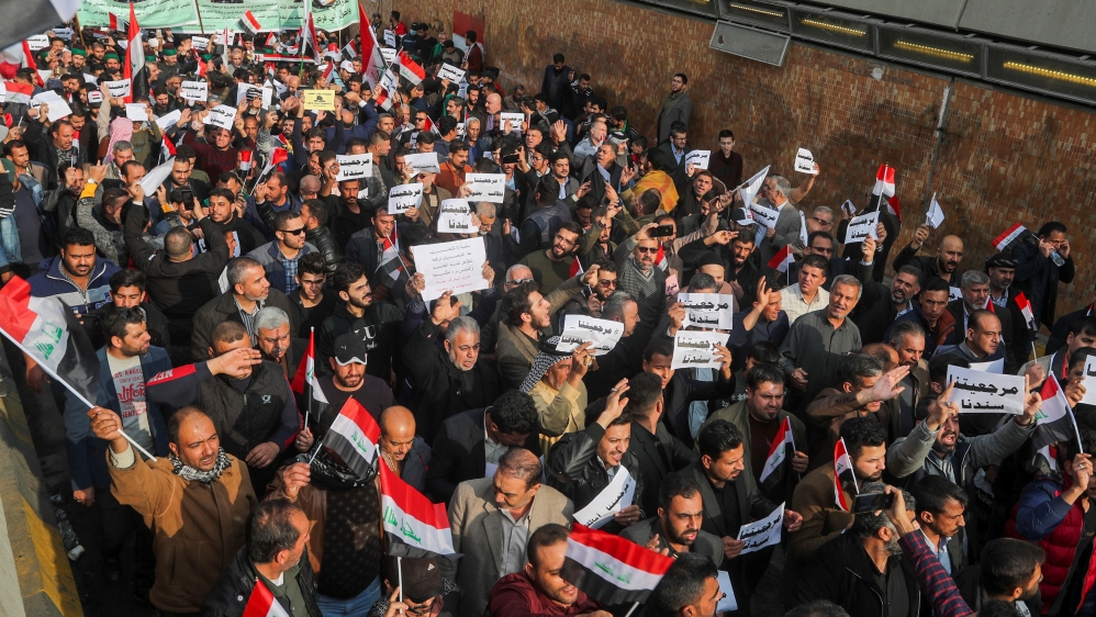 Iraqi demonstrators gather during ongoing anti-government protests in Baghdad