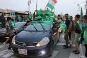 Kurdish supporters of the Patriotic Union of Kurdistan (PUK) celebrate after the closing of ballot boxes during the parliamentary election in Kirkuk, Iraq, May 12, 2018 [File:Ako Rasheed/Reuters]