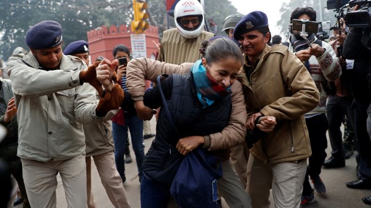 A demonstrator is detained during a protest against a new citizenship law, in Delhi, India, December 19, 2019. REUTERS/Danish Siddiqui