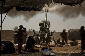 In this file photo from April 17, 2017, US soldiers from the 82nd Airborne Division fire artillery in support of Iraqi forces fighting ISIL from their base east of Mosul [File: Maya Alleruzzo/AP Photo