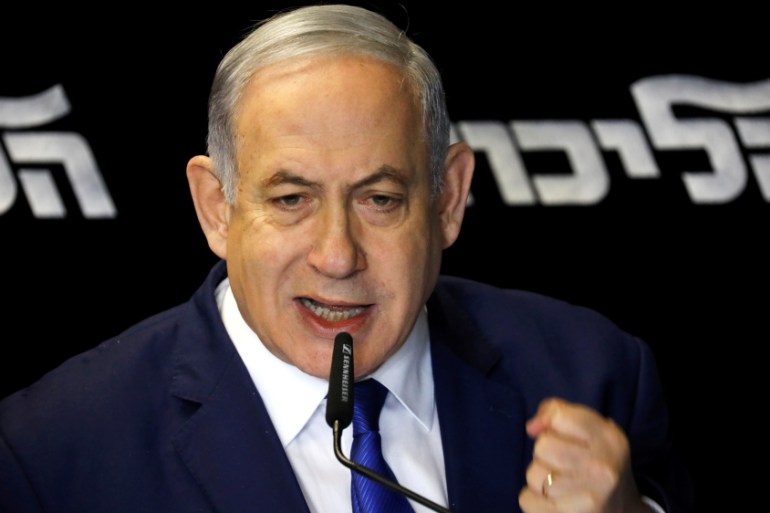 Israeli Prime Minister Benjamin Netanyahu addresses the media in Airport City near Tel Aviv