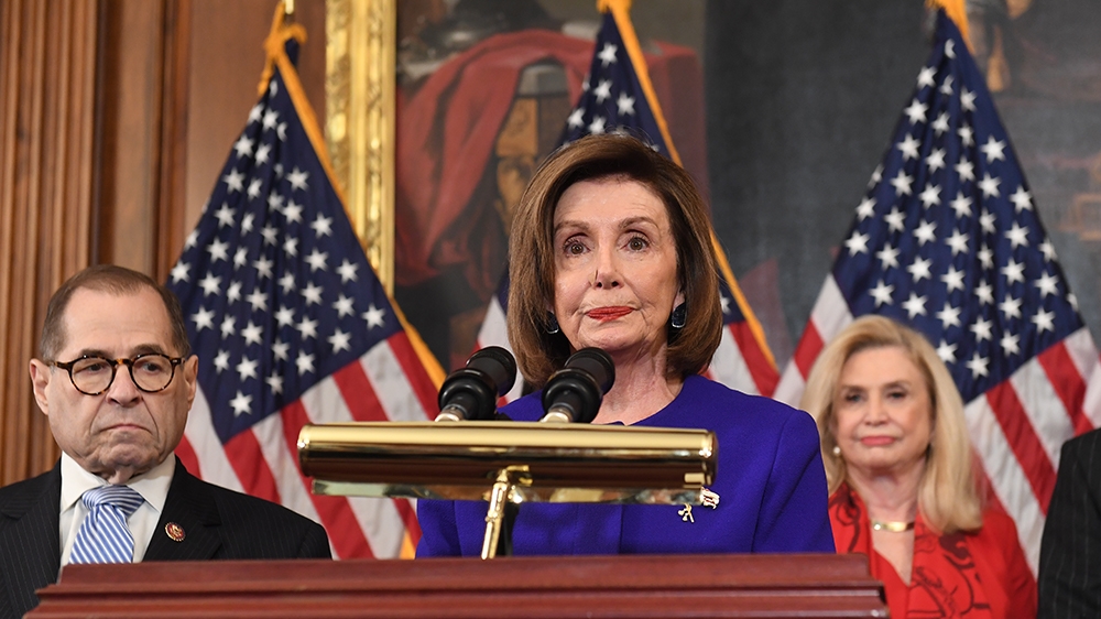 House Speaker Nancy Pelosi (D-CA) speaks next to House Judiciary Chairman Jerry Nadler(L), Democrat of New York, House Permanent Select Committee on Intelligence as they announce articles of impeachme