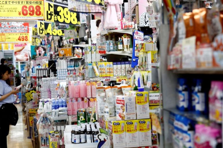 Shoppers browse products at Japanese