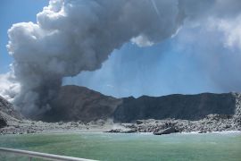 This handout photograph courtesy of Michael Schade shows the volcano on New Zealand''s White Island spewing steam and ash minutes following an eruption on December 9, 2019. New Zealand police said at l