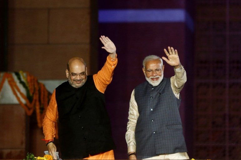 BJP President Amit Shah and Indian Prime Minister Narendra Modi gesture after the election results in New Delhi, India, May 23, 2019. REUTERS/Adnan Abidi