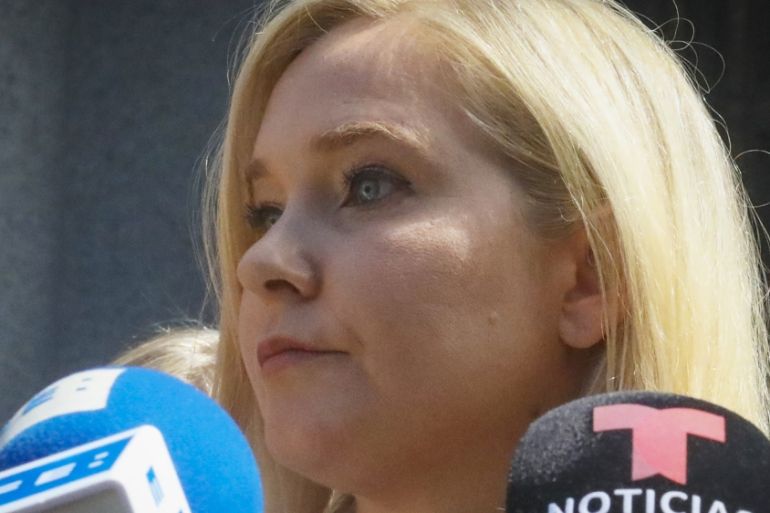 In this Aug. 27, 2019, photo, Virginia Roberts Giuffre, who says she was trafficked by sex offender Jeffrey Epstein, holds a news conference outside a Manhattan court where sexual assault claimants in