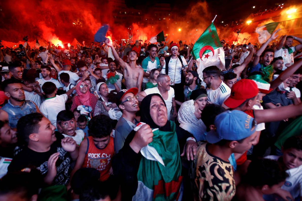 Football fans react after Algeria won the semi-final soccer match against Nigeria in the Africa Cup of Nations 2019, in Algiers, Algeria July 14, 2019. REUTERS/Ramzi Boudina TPX IMAGES OF THE DAY