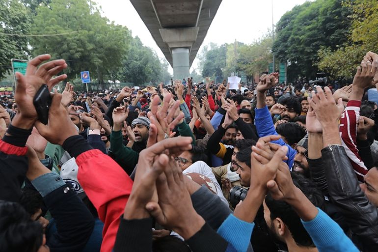 Indian protesters shout slogans outside the Jamia Millia Islamia University during a protest against the Citizenship (Amendment) Bill 2019 (CAB) in New Delhi, India, 16 December 2019. The bill will g