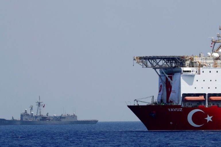 Turkish drill boat and naval frigate - reuters
