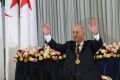 Newly elected Algerian President Abdelmadjid Tebboune gestures during a swearing-in ceremony in Algiers
