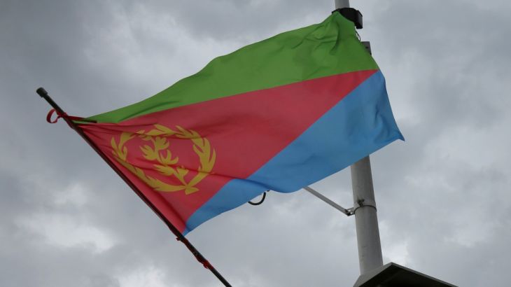 Ethiopian and Eritrean flags flutter during the welcoming ceremony of Eritrean Foreign Minister Osman Saleh and his delegation at the Bole International Airport in Addis Ababa
