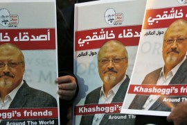 Activists protesting the killing of Saudi journalist Jamal Khashoggi hold a candlelight vigil outside Saudi Arabia''s consulate in Istanbul, Thursday, Oct. 25, 2018. The posters read in Arabic:'' Khas
