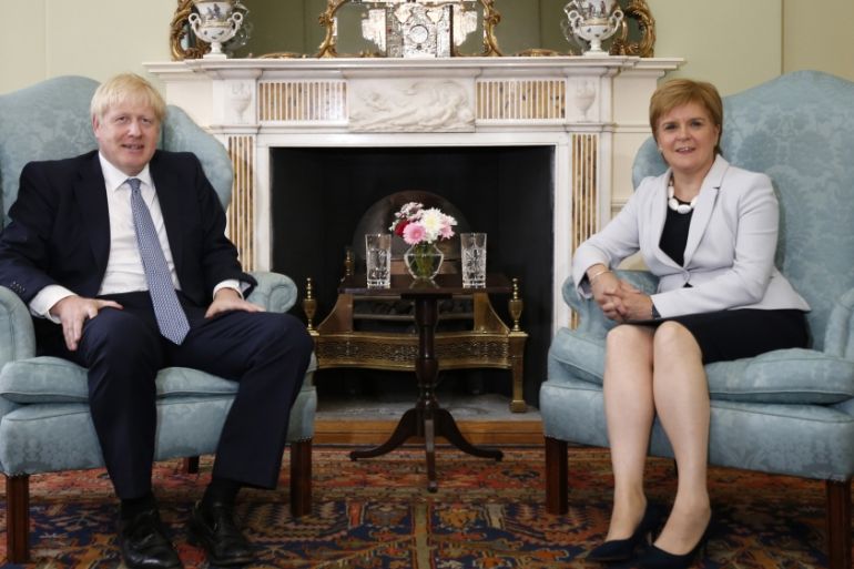Boris Johnson (L) and Scotland''s First Minister Nicola Sturgeon