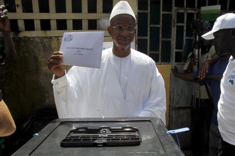 Cellou Dalein Diallo casts his vote at a polling station during a presidential election in Conakry,