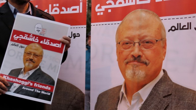 A man holds a picture of Jamal Khashoggi during the demonstration in front of Saudi Arabian consulate in Istanbul, Turkey, 25 October 2018. Turkish President Erdogan addressed the parliament on the ca