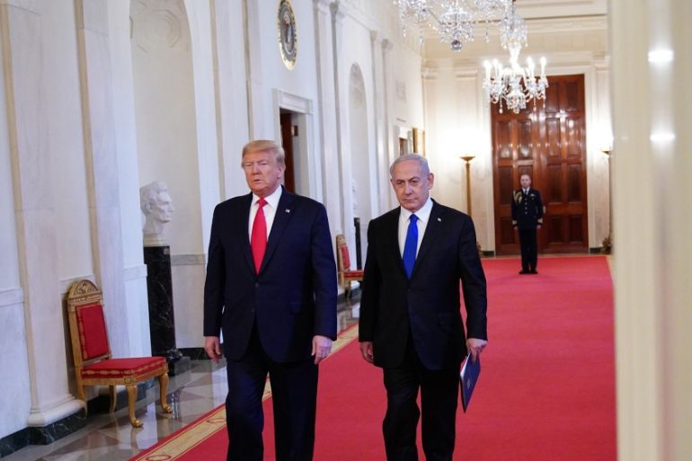 US President Donald Trump and Israeli Prime Minister Benjamin Netanyahu arrive for an announcement of Trump''s Middle East peace plan in the East Room of the White House in Washington, DC on January 28