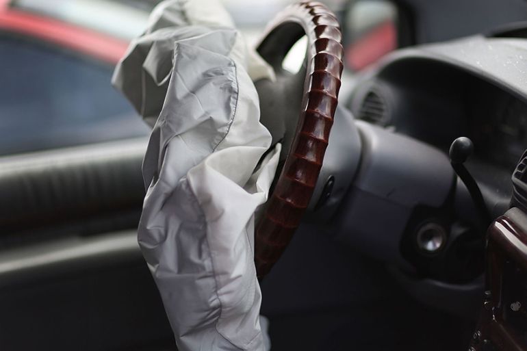 MEDLEY, FL - MAY 22: A deployed airbag is seen in a Chrysler vehicle at the LKQ Pick Your Part salvage yard on May 22, 2015 in Medley, Florida.