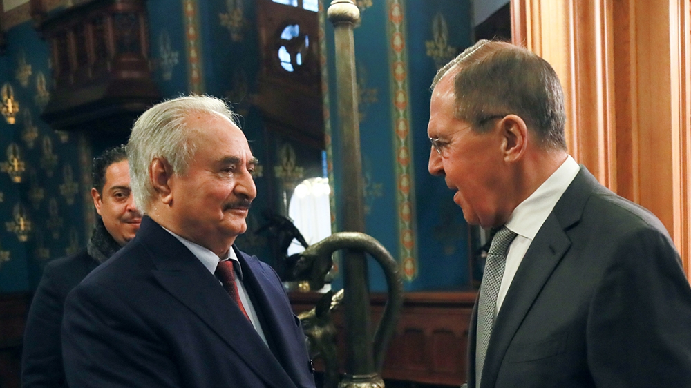 This handout picture released by the Russian Foreign Ministry on January 13, 2020 shows Russian Foreign Minister Sergei Lavrov welcoming Libya's military strongman Khalifa Haftar in Moscow. (Photo by 