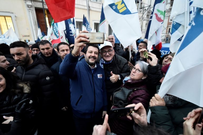 Leader of Italy''s far-right League party Matteo Salvini takes a selfie with a supporter at a rally ahead of a regional election in Emilia-Romagna, in Ravenna