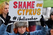 Protesters supporting a British woman found guilty of lying in a rape case in Cyprus, take part in a march in London on January 6, 2020 [Reuters/Toby Melville]