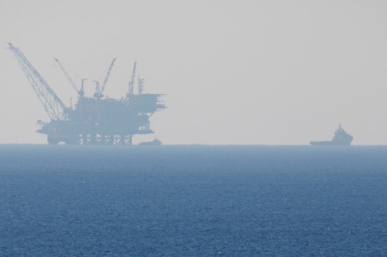 An Israeli navy boat is seen next to the production platform of Leviathan natural gas field in the Mediterranean Sea near Kibbutz Nahsholim in northern Israel