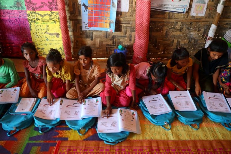 Rohingya refugee children attend a class to learn Burmese language at a refugee camp in Cox''s Bazar