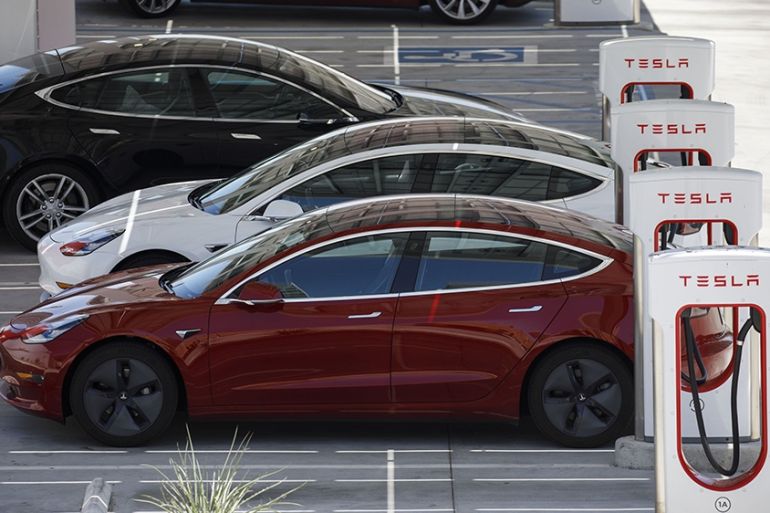 Tesla Inc. Model 3 electric vehicles charge at the Tesla Supercharger station in Kettleman City, California, U.S., on Wednesday, July 31, 2019