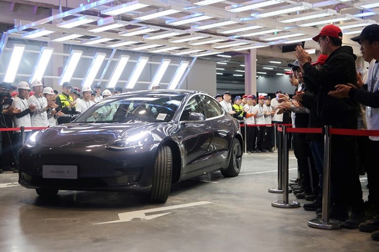 A China-made Tesla Model 3 vehicle is seen at a delivery ceremony in the Shanghai Gigafactory of the U.S. electric car maker in Shanghai, China December 30, 2019