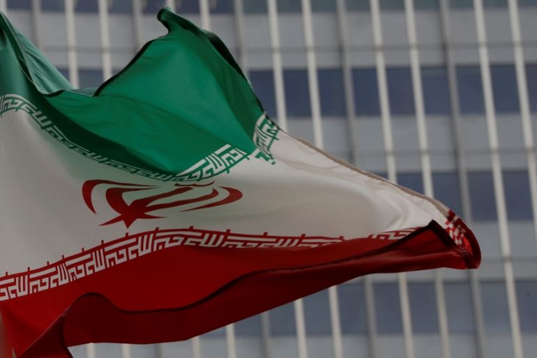 An Iranian flag flutters in front of the International Atomic Energy Agency (IAEA) headquarters in Vienna, Austria September 9, 2019. REUTERS/Leonhard Foeger/File Photo