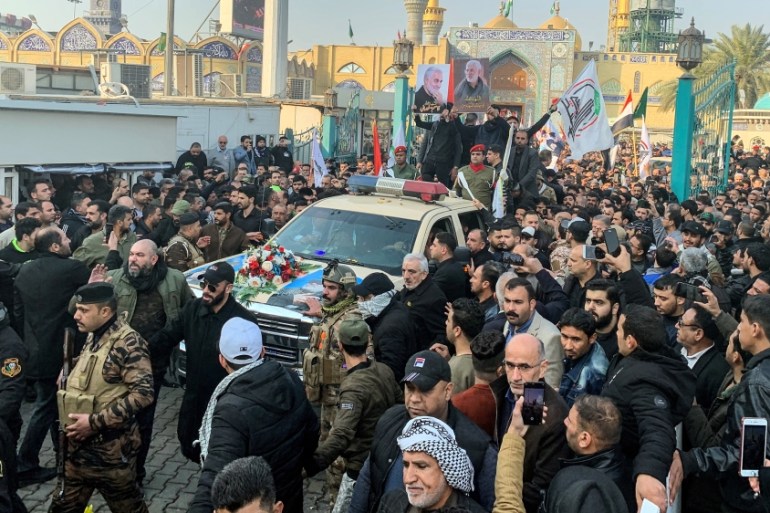 People gather at the funeral of the Iranian Major-General Qassem Soleimani, top commander of the elite Quds Force of the Revolutionary Guards, and the Iraqi militia commander Abu Mahdi al-Muhandis, wh