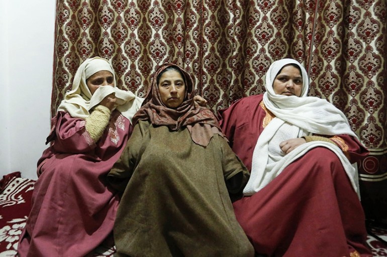 Saleema Bano, Osaib''s mother, in the middle, being consoled by her relatives at her home five months after her son''s death. [Shuaib Bashir/Al Jazeera]