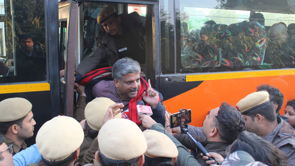 Detained protesters taken into bus 