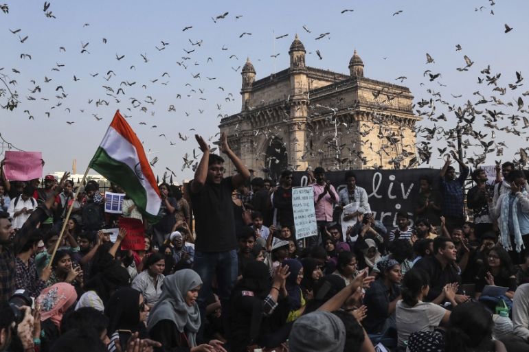 Pigeons fly near the Gateway of India monument as students participate in a protest against Sunday''s assault by masked assailants at New Delhi''s Jawaharlal Nehru University, in Mumbai, India, Monday,