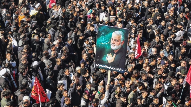 Iranian mourners gather for the burial of slain top general Qasem Soleimani in his hometown Kerman on January 7, 2020. Soleimani was killed outside Baghdad airport Friday in a drone strike ordered by