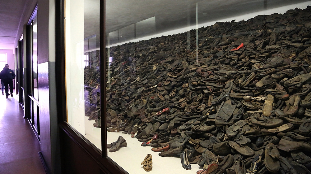 One exhibit at the Auschwitz-Birkenau Memorial and Museum shows shoes that belonged to people deported to the camp complex. The camp complex was liberated on January 27, 1945. [Verónica Zaragovia/Al J