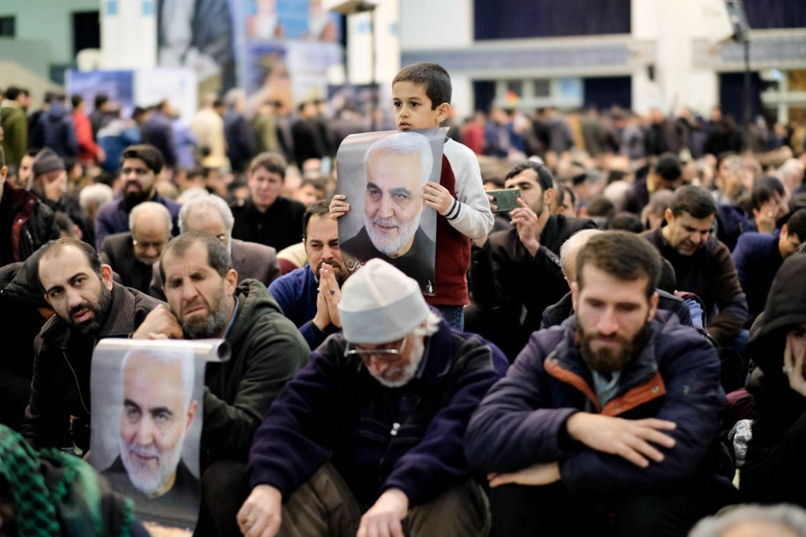 Many of the mourners, who waited since Sunday night, for the arrival of Soleimani’s remains, waved different images of the slain commander, while others carried miniature flags of Iran.