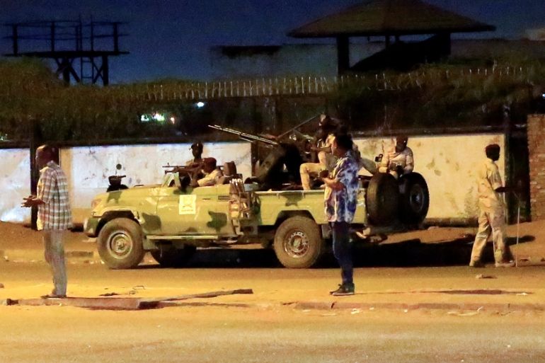 Members of the Sudanese Rapid Support Forces (RSF) are seen near the area where gunmen opened fire outside buildings used by Sudan''s National Intelligence and Security Service (NISS) in Khartoum, Suda