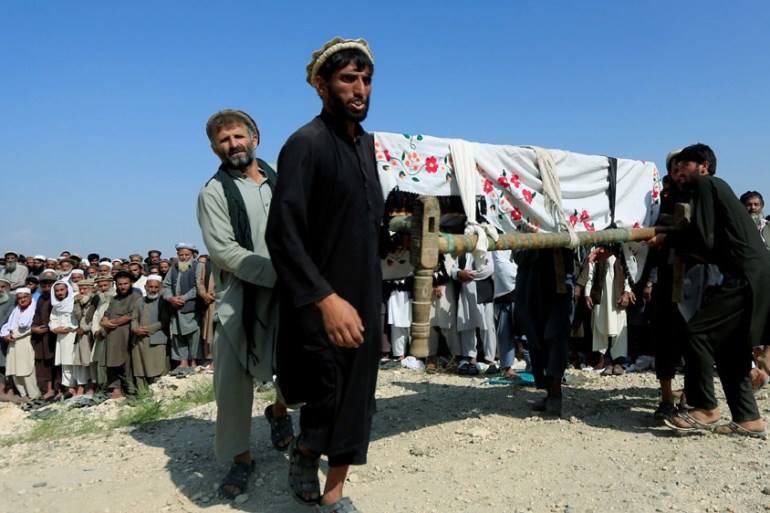 INDIA - TOURISM - HERITAGEMen carry a coffin of one of the victims after a drone strike, in Khogyani district of Nangarhar province, Afghanistan