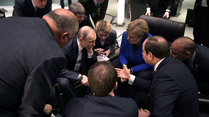 Russia''s President Vladimir Putin and German Chancellor Angela Merkel meet on sideline of the Libya summit in Berlin