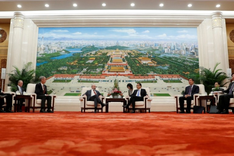 Chairman of the US-China Business Council Evan Greenberg attends a meeting with Chinese Premier Li Keqiang at the Great Hall of the People in Beijing
