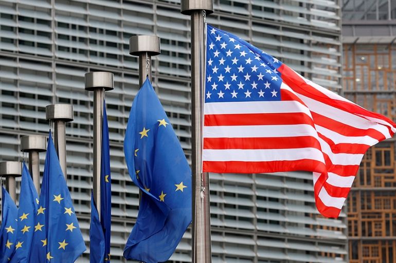 U.S. and European Union flags are pictured during the visit of Vice President Mike Pence to the European Commission headquarters in Brussels, Belgium February 20, 2017