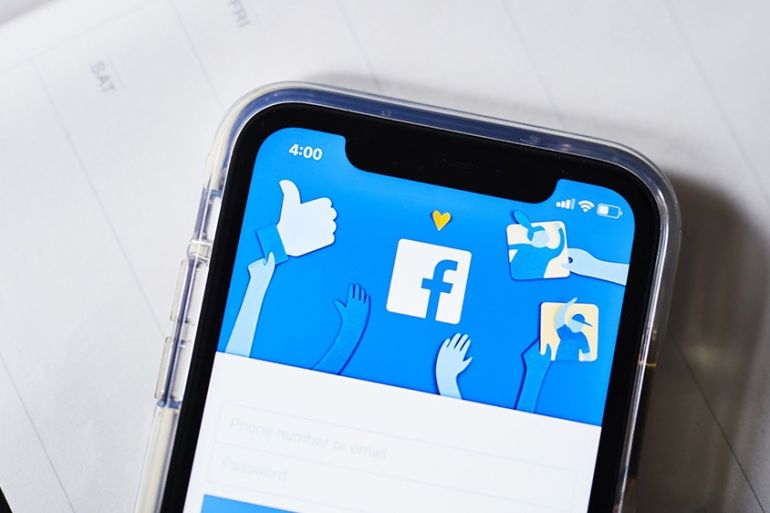 The Facebook Inc. website is displayed on an Apple Inc. iPhone in this arranged photograph taken in the Brooklyn borough of New York, U.S., on Monday, April 22, 2019
