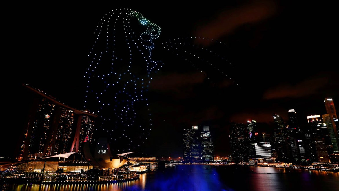 Tourism icon, the Merlion, formed by drones, hovers over Marina Bay during New Year''s Eve celebrations in Singapore December 31, 2019. REUTERS/Edgar Su TPX IMAGES OF THE DAY