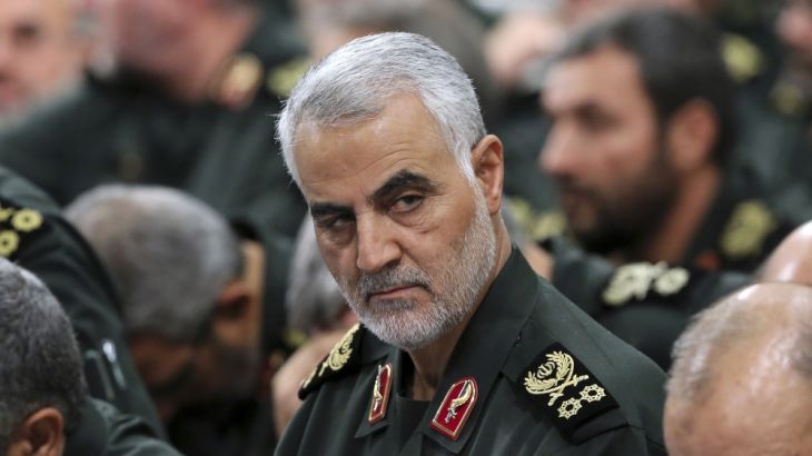 In this Sept. 18, 2016 photo released by an official website of the office of the Iranian supreme leader, Revolutionary Guard Gen. Qassem Soleimani, center, attends a meeting with Supreme Leader Ayato
